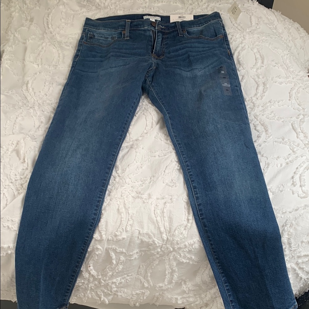 Slim Blue Denim Jeans with Subtle Fading